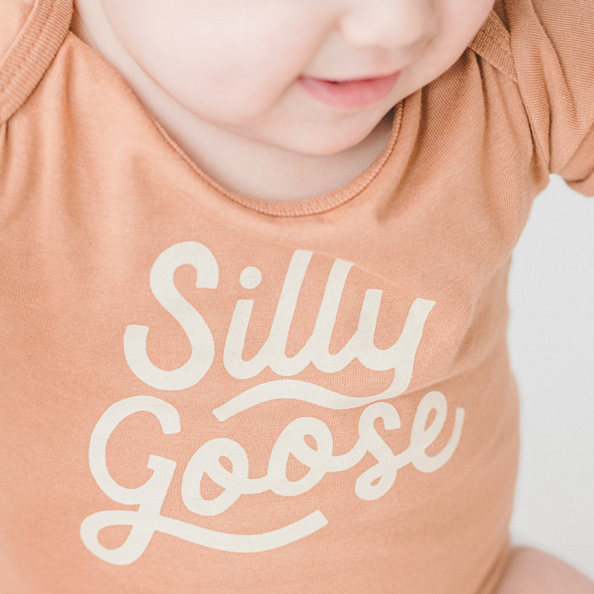 Silly Goose Baby Onesie in Ginger